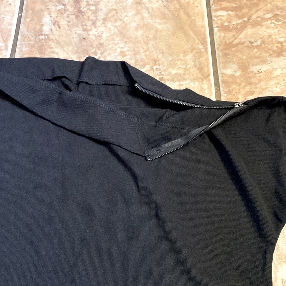 Black shoulder zipper shirt.